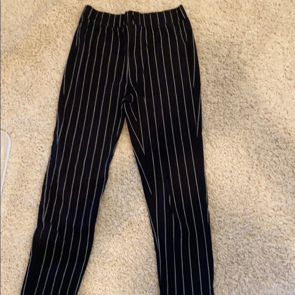 Black with white striped pants